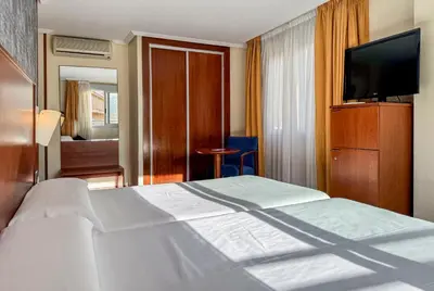 Cama o camas de una habitación en Torreluz Centro