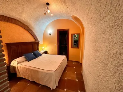 Cama o camas de una habitación en Cuevas La Granja