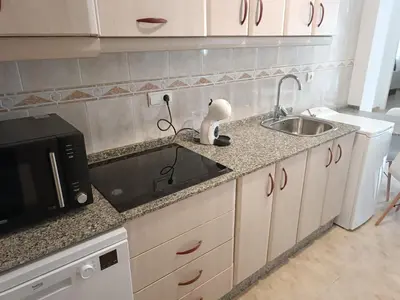 Una cocina o zona de cocina en Vera Natura Apartamento Alamar
