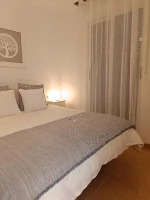 Cama o camas de una habitación en Bahia de Vera apartamento Abaco