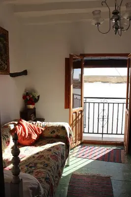 Cama o camas de una habitación en Casa Estrella de las nieves La Alpujarra