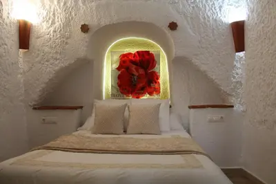 Cama o camas de una habitación en Cuevas Hammam Abuelo Jose