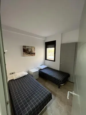 Cama o camas de una habitación en Apartamento Lujo A1 Golf Resort, Valle del este