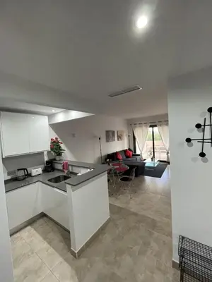 Una cocina o zona de cocina en Apartamento Lujo A1 Golf Resort, Valle del este