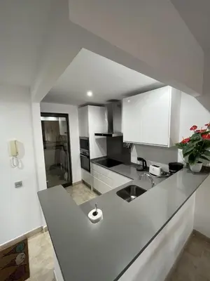 Una cocina o zona de cocina en Apartamento Lujo A1 Golf Resort, Valle del este