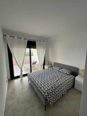 Cama o camas de una habitación en Apartamento Lujo A1 Golf Resort, Valle del este