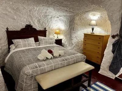 Cama o camas de una habitación en Cuevas La Veranda