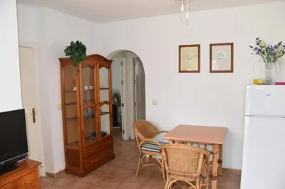 Una televisión o centro de entretenimiento en Cozy Coastal Retreat in San Juan de Los Terreros