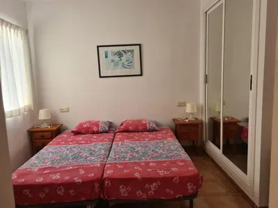 Cama o camas de una habitación en Cozy Coastal Retreat in San Juan de Los Terreros