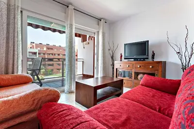 Una televisión o centro de entretenimiento en Mar Brasilia Apartamento