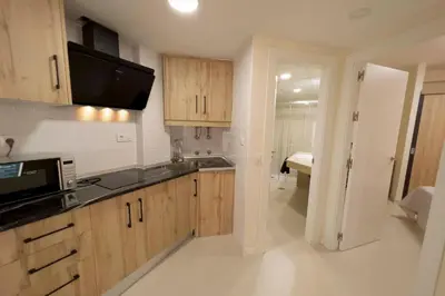 Una cocina o zona de cocina en Vera Playa - Laguna Beach