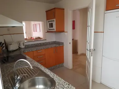 Una cocina o zona de cocina en Apartamento Pelicanos Golf & Beach - spacious and modern with terrace and private pool