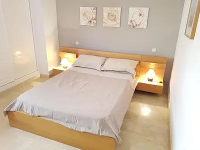 Cama o camas de una habitación en Apartamento Pelicanos Golf & Beach - spacious and modern with terrace and private pool