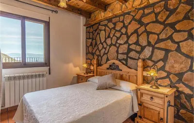 Cama o camas de una habitación en Awesome Home In Mecina Bombarón