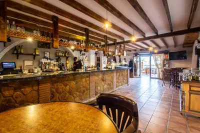 El salón o zona de bar de Hostal Rural Turre