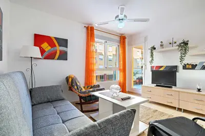 Una televisión o centro de entretenimiento en Santa Ana Apartamento