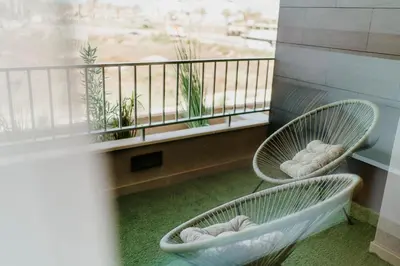 Zona de estar de Tres bel apartamento primera linea de Playa Serena