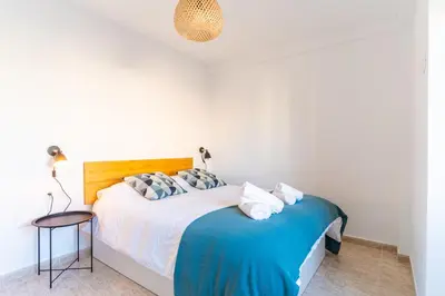 Cama o camas de una habitación en Almare Suites Burbujas I - Vistas al mar, golf, junto a la playa