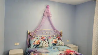 Cama o camas de una habitación en Alojamiento rural Casa Clara la Pescaora