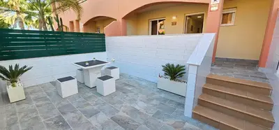 Un balcón o terraza de Homes of Spain, Apartamentos Paraiso de Vera Playa, Ed Tahiti bajo H, a pie de la playa, vistas piscina