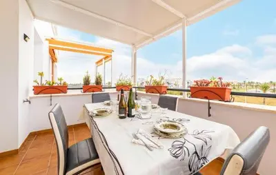 Un balcón o terraza de GOLF, PISCINA,PLAYA