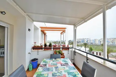 Un balcón o terraza de GOLF, PISCINA,PLAYA
