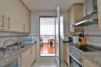 Una cocina o zona de cocina en GOLF, PISCINA,PLAYA