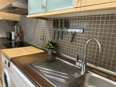 Una cocina o zona de cocina en Ático Parque Salinas BEACHFRONT