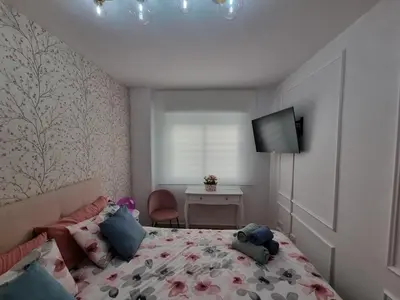 Cama o camas de una habitación en Apartamento Luz del Mediterraneo Garrucha