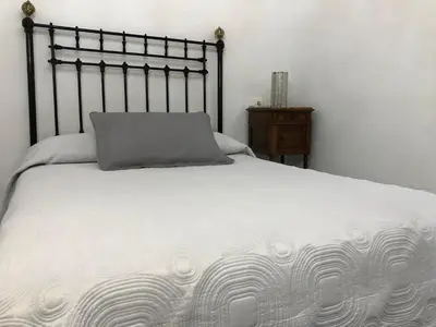 Cama o camas de una habitación en Cortijo los Garridos - 6 huéspedes