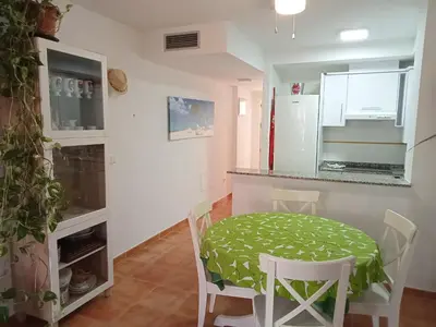 Una cocina o zona de cocina en Precioso apartamento con piscina y garage