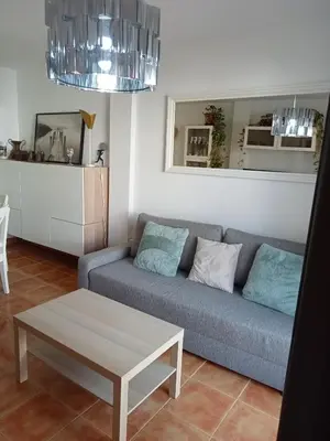 Zona de estar de Precioso apartamento con piscina y garage