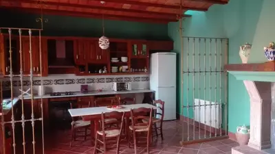Una cocina o zona de cocina en Ala Mexicana