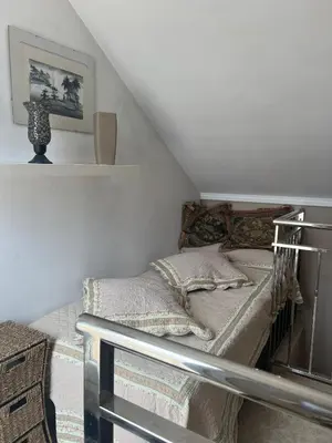 Cama o camas de una habitación en Ático portofino