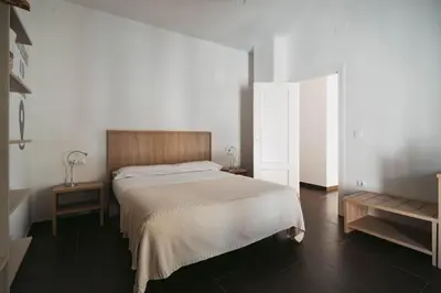 Cama o camas de una habitación en La Fonda de la Calle Ancha