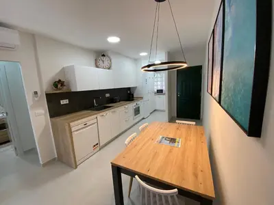 Una cocina o zona de cocina en Torrelaguna Bajo