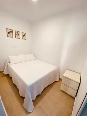 Cama o camas de una habitación en APARTAMENTO BUEN DÍA
