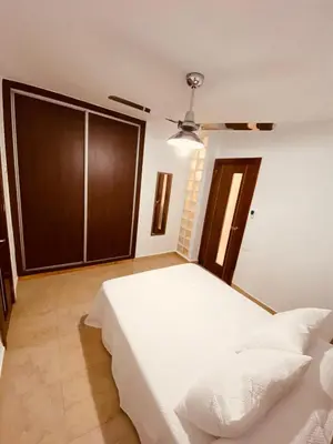 Cama o camas de una habitación en APARTAMENTO BUEN DÍA