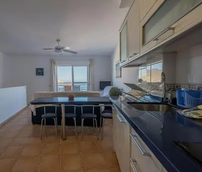 Una cocina o zona de cocina en Cala Amarilla