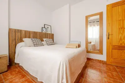 Cama o camas de una habitación en Alzeina, casa con mucho encanto a 300mtr de la playa