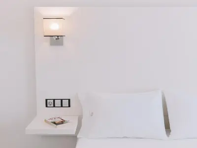 Cama o camas de una habitación en Hostal Las Gaviotas del Cabo