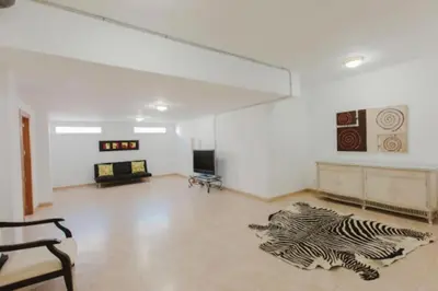 Una televisión o centro de entretenimiento en Villa Espigón