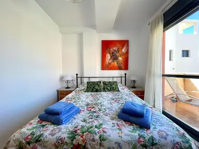 Cama o camas de una habitación en Apartment near beach with pools in Spain