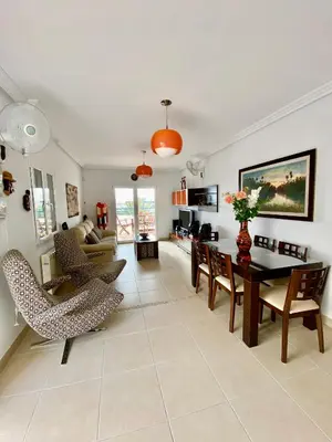 Una televisión o centro de entretenimiento en Apartamento Pueblo Dorado