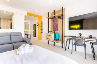 Cama o camas de una habitación en Apartaments Paseo Marítimo by Expoholidays