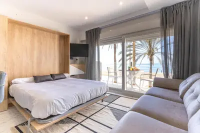 Cama o camas de una habitación en Apartaments Paseo Marítimo by Expoholidays