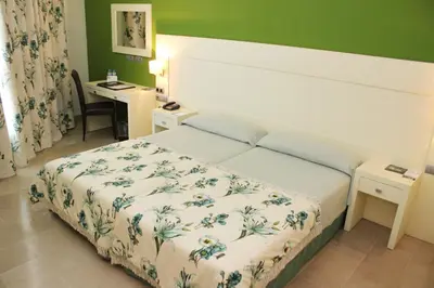 Cama o camas de una habitación en Senator Águilas