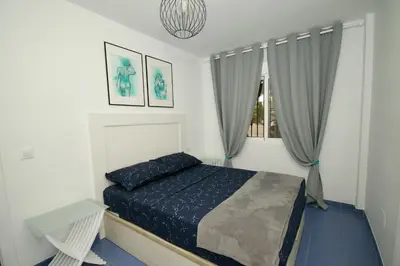 Cama o camas de una habitación en Xposure beach apartment