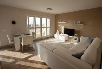 Zona de estar de Almerimar Porto Fino - Appartement de luxe, vue mer