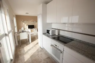 Una cocina o zona de cocina en Almerimar Porto Fino - Appartement de luxe, vue mer